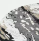 Durable machine-made rug with modern patterns, soft finish, and versatile design for home décor.