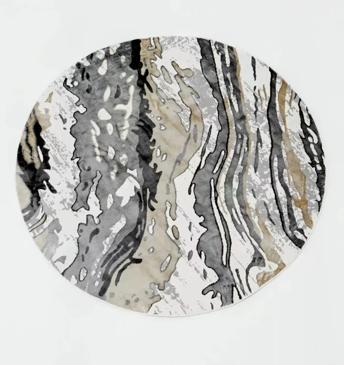 Durable machine-made rug with modern patterns, soft finish, and versatile design for home décor.