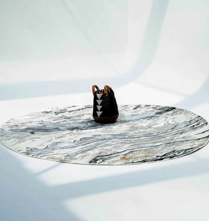 Durable machine-made rug with modern patterns, soft finish, and versatile design for home décor.
