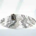 Durable machine-made rug with modern patterns, soft finish, and versatile design for home décor.