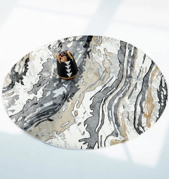 Durable machine-made rug with modern patterns, soft finish, and versatile design for home décor.