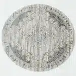 Durable machine-made rug with modern patterns, soft finish, and versatile design for home décor.