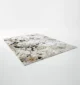 Durable machine-made rug with modern patterns, soft finish, and versatile design for home décor.