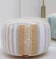 Decorative pouf for living room with stylish design, soft comfort, and versatile functionality.