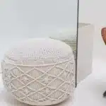 Decorative pouf for living room with stylish design, soft comfort, and versatile functionality.