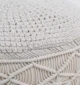 Decorative pouf for living room with stylish design, soft comfort, and versatile functionality.