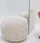 Decorative pouf for living room with stylish design, soft comfort, and versatile functionality.