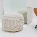 Decorative pouf for living room with stylish design, soft comfort, and versatile functionality.