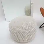 Decorative pouf for living room with stylish design, soft comfort, and versatile functionality.