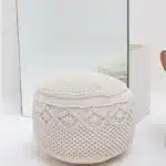 Decorative pouf for living room with stylish design, soft comfort, and versatile functionality.