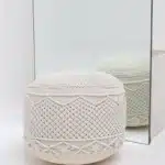 Decorative pouf for living room with stylish design, soft comfort, and versatile functionality.