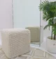 Decorative pouf for living room with stylish design, soft comfort, and versatile functionality.