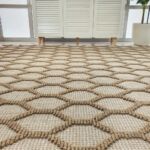 Woven rug with artisanal texture, durable quality, and versatile design for modern and classic interiors.