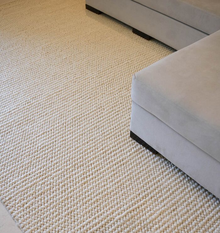 Bohemian hand woven wool rug from India, versatile indoor rug and hallway carpet for Dubai and UAE homes.