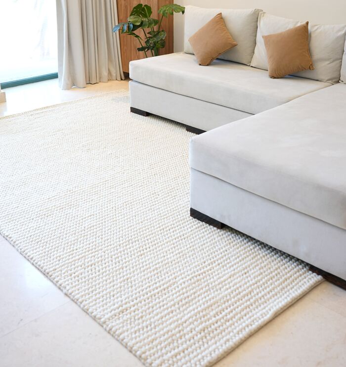 Bohemian hand woven wool rug from India, versatile indoor rug and hallway carpet for Dubai and UAE homes.