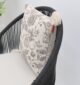 Outdoor cushions and sofa cushions arranged beautifully on a sofa and bed, including car cushions, from Ramsha Home in Dubai, UAE.