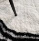Luxurious plum fur rug with a soft shaggy texture, perfect as a living room carpet or bedroom rug in UAE homes.