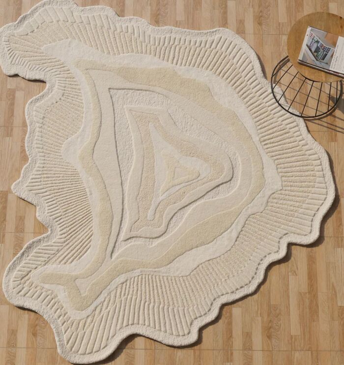 Handmade rug crafted with artisanal skill, offering unique design, warmth, and lasting durability.
