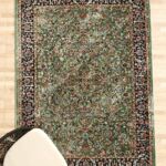 Durable machine-made rug with modern design, soft texture, and long-lasting quality for home décor.