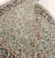 Machine-made rug featuring durable construction, stylish patterns, and easy-care design for modern homes.