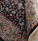 Machine-made rug with modern patterns, soft texture, and long-lasting durability for home décor.