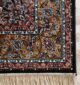 Machine-made rug with modern patterns, soft texture, and long-lasting durability for home décor.