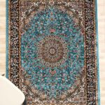 Durable machine-made rug with modern design, soft texture, and long-lasting quality for home décor.