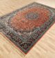 Machine-made rug featuring durable construction, stylish patterns, and easy-care design for modern homes.
