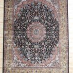 Machine-made rug featuring durable construction, stylish patterns, and easy-care design for modern homes.