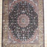 Machine-made rug featuring durable construction, stylish patterns, and easy-care design for modern homes.