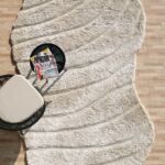 Shaggy shape rug for living room, featuring plush texture, modern design, and cozy comfort.