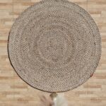 Round jute carpet for living room and bedroom, designed in a modern carpet style to suit home décor in Dubai.