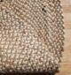 Round jute carpet for living room and bedroom, designed in a modern carpet style to suit home décor in Dubai.