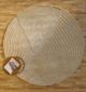 Round jute carpet for living room and bedroom, designed in a modern carpet style to suit home décor in Dubai.