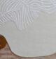 Round jute carpet for living room and bedroom, designed in a modern carpet style to suit home décor in Dubai.