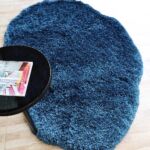 A luxurious handmade rug crafted from hand woven wool with a soft white fur texture, designed as a shag rug for modern homes in Dubai and across UAE.
