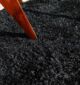 Handmade wool rug with soft white fur shag texture, adding warmth and luxury to living room or bedroom décor in Dubai and across UAE.