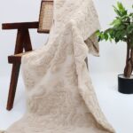 Cozy throw blankets and sofa throws with soft textures, perfect as bed throws and decorative throw pillows.