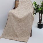 Cozy throw blankets and sofa throws with soft textures, perfect as bed throws and decorative throw pillows.