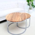 Modern nesting coffee table set with round wooden top and silver metal frame