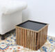 Close-up inclined top view of modern square slatted wooden coffee table GH-99