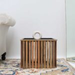 Straight side view of modern square wooden and iron coffee table with slatted top GH-99