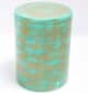 Round modern coffee table with turquoise dot pattern and golden iron base – vibrant minimalist design