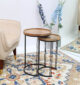 Set of 2 wooden nesting side tables with round solid wood tops and black iron bases – modern industrial design