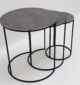 Set of 3 modern nesting side tables with antique brass tops and black iron bases – circular minimalist design