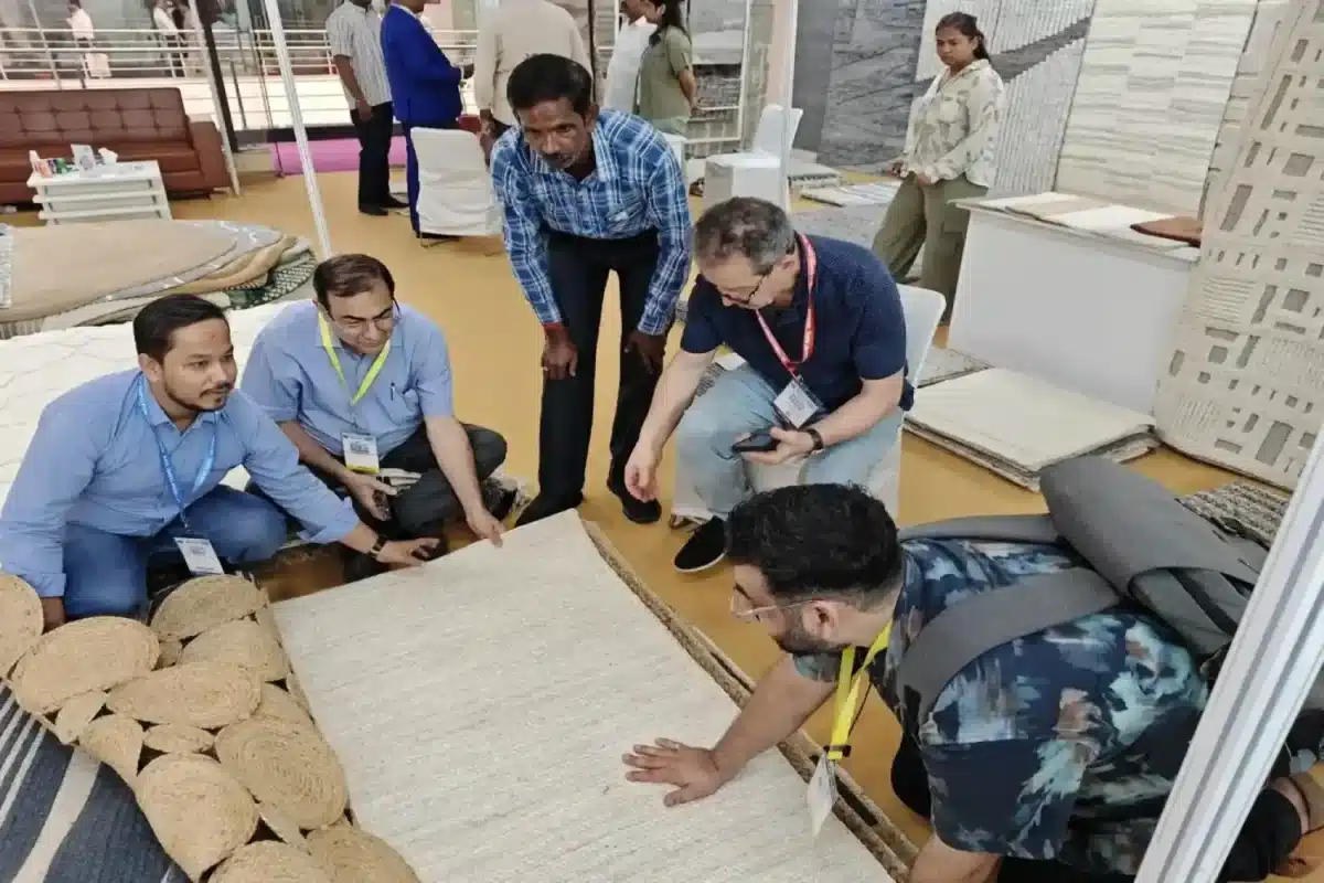 Customers buying rugs and asking questions at Ramsha Home store fair in UAE