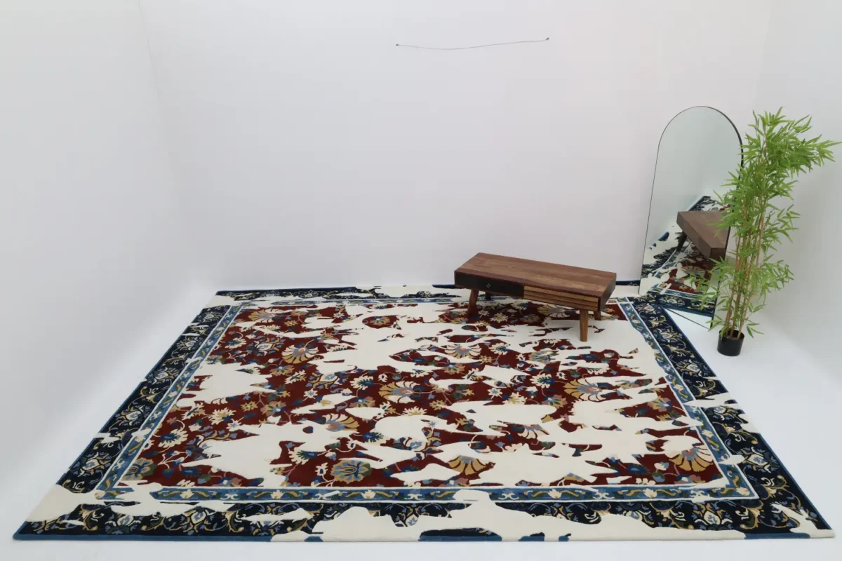 Traditional floral rug in a rectangular shape with dark blue and red botanical patterns on a cream base, featuring a classic, ornate border.